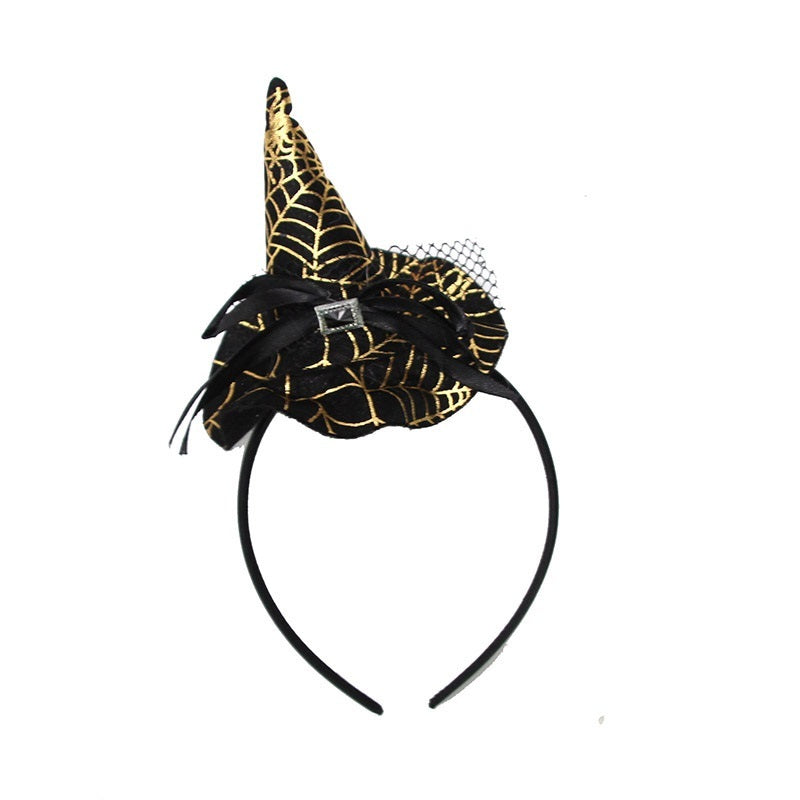 Halloween-themed headband with a black and gold spiderweb design