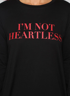 Black Fashion Nova Tunic shirt with red text 'I'M NOT HEARTLESS' on the front