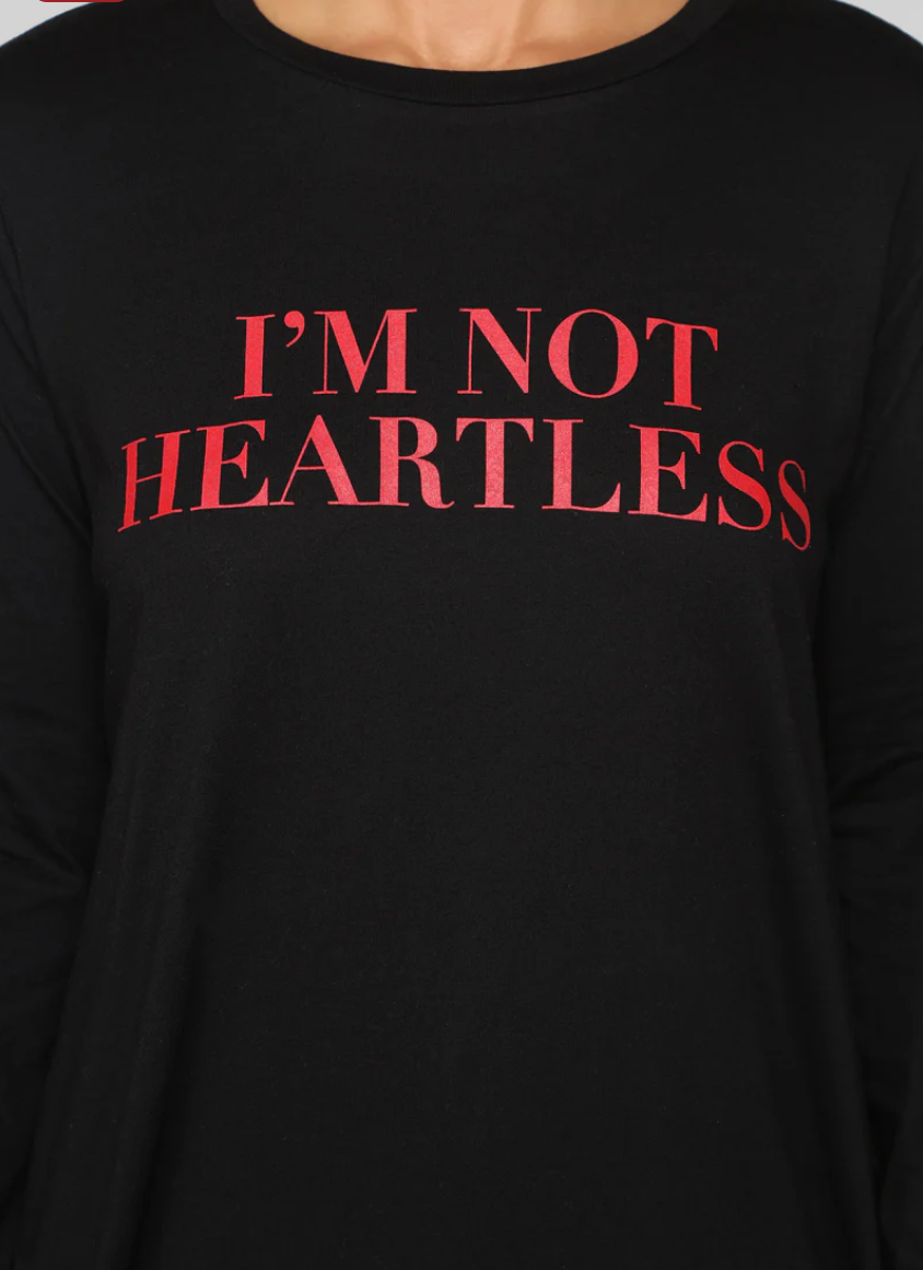 Black Fashion Nova Tunic shirt with red text 'I'M NOT HEARTLESS' on the front