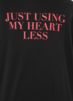 Black Fashion Nova t-shirt with red text 'JUST USING MY HEART LESS' on the back