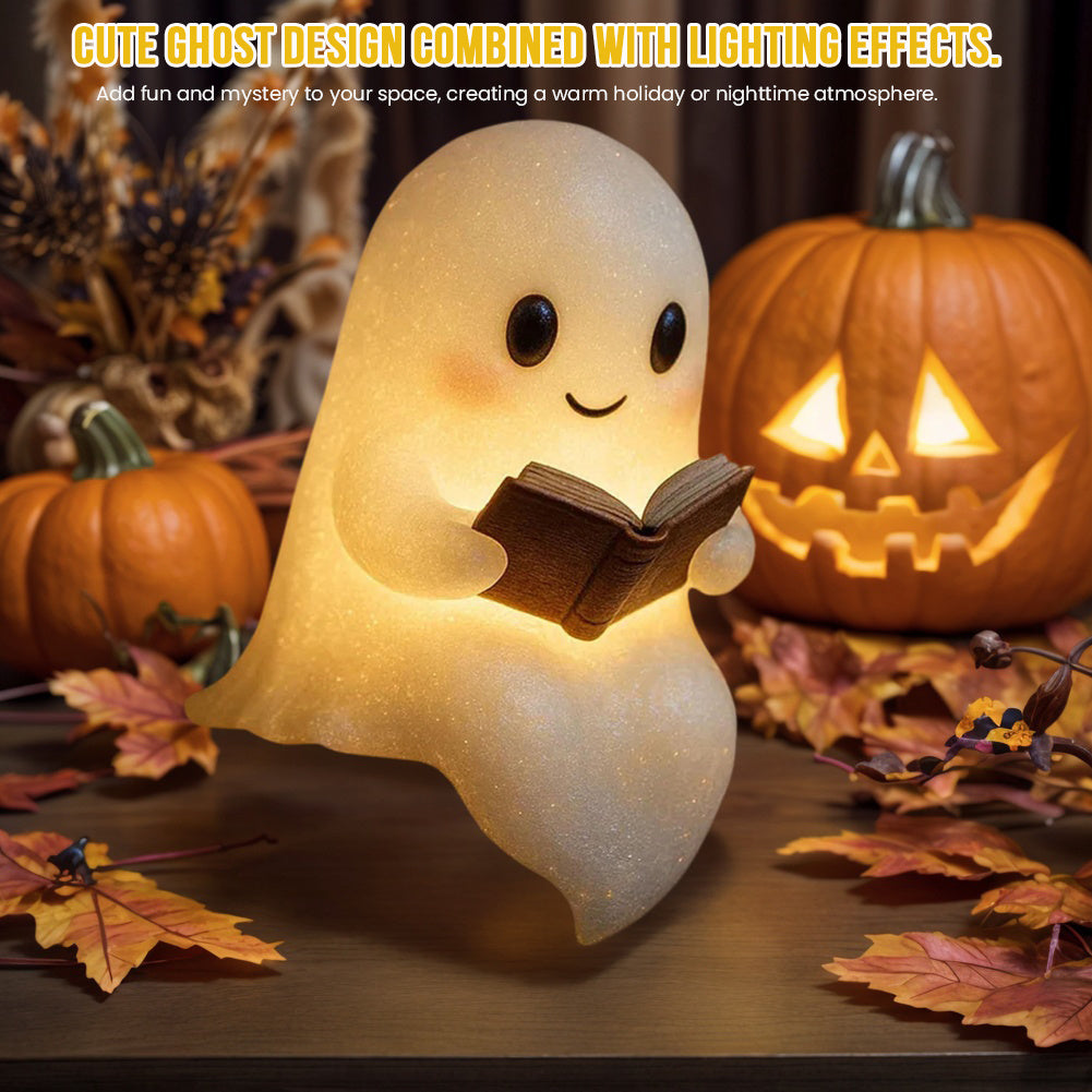 Cute ghost-shaped lamp reading a book 