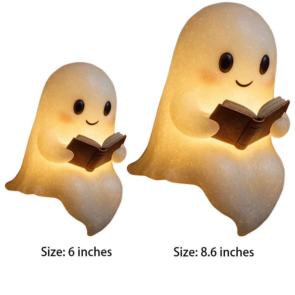 Two ghost-shaped night lights, one smaller and one larger, holding books 