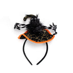 Halloween-themed headband with black spider and orange web design 