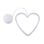 Heart-shaped light fixture with a white bulb 