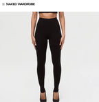 Person wearing black Naked Wardrobe leggings on a white background with 'Naked Wardrobe' branding.