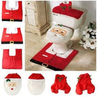Set of Santa Claus-themed bathroom accessories including a toilet seat cover, rug, and lid cover.