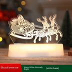 Decorative lamp with Santa in sleigh and reindeer 