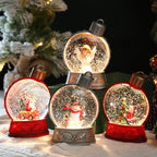 Set of Christmas-themed snow globes with animated figures