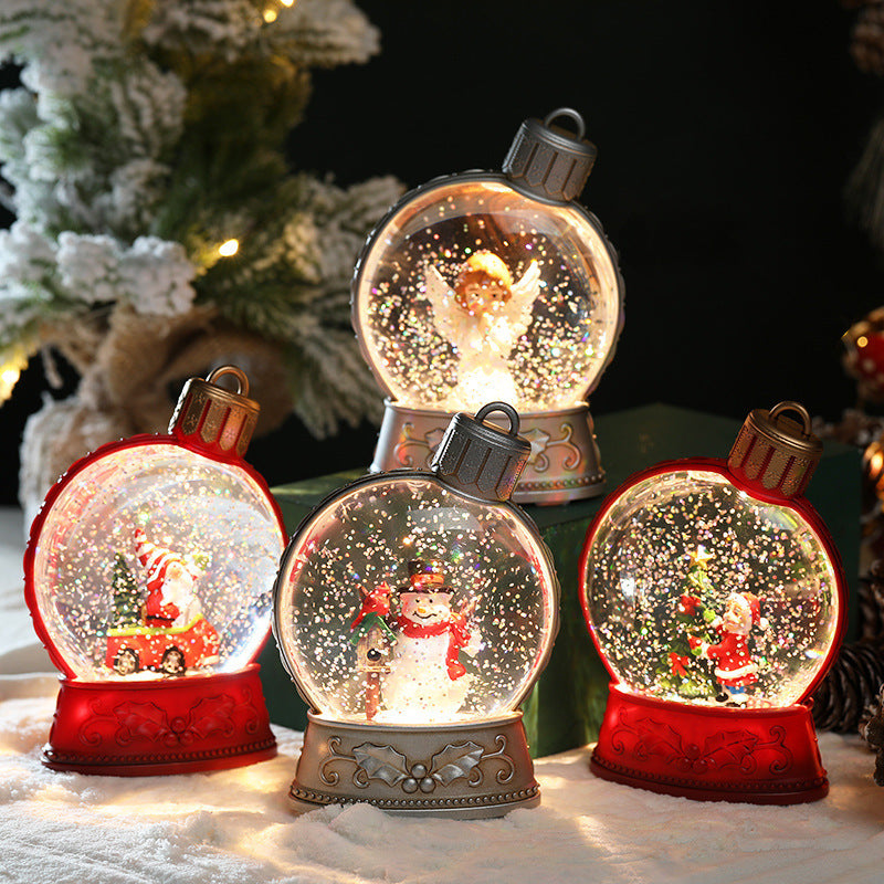 Set of Christmas-themed snow globes with animated figures