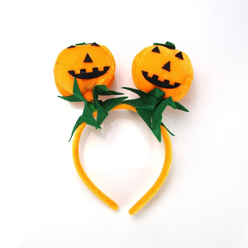 Pumpkin-shaped headbands with green leaves 