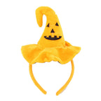 Yellow pumpkin-shaped headband with a smiling face 