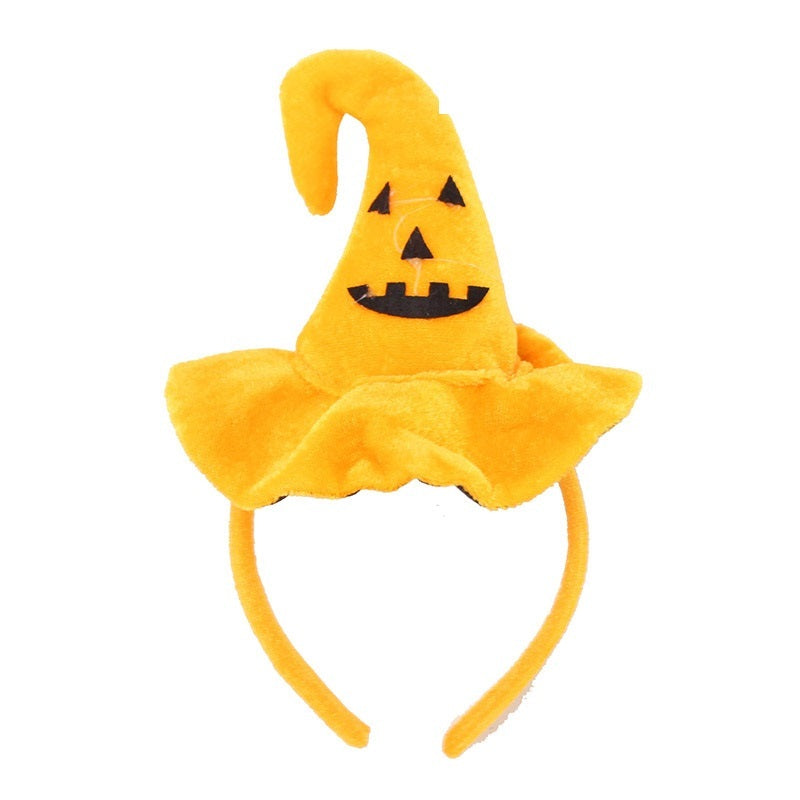 Yellow pumpkin-shaped headband with a smiling face 