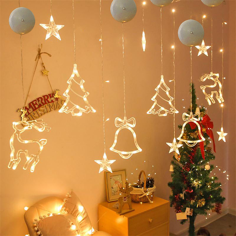 Decorative string lights with Christmas-themed decorations 